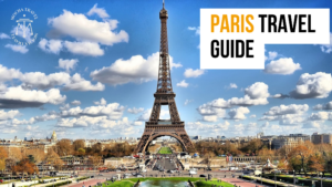 Paris Travel Guide with Eiffel Tower under a blue sky and fluffy clouds. Mocha Travel logo top left, bold travel title top right.